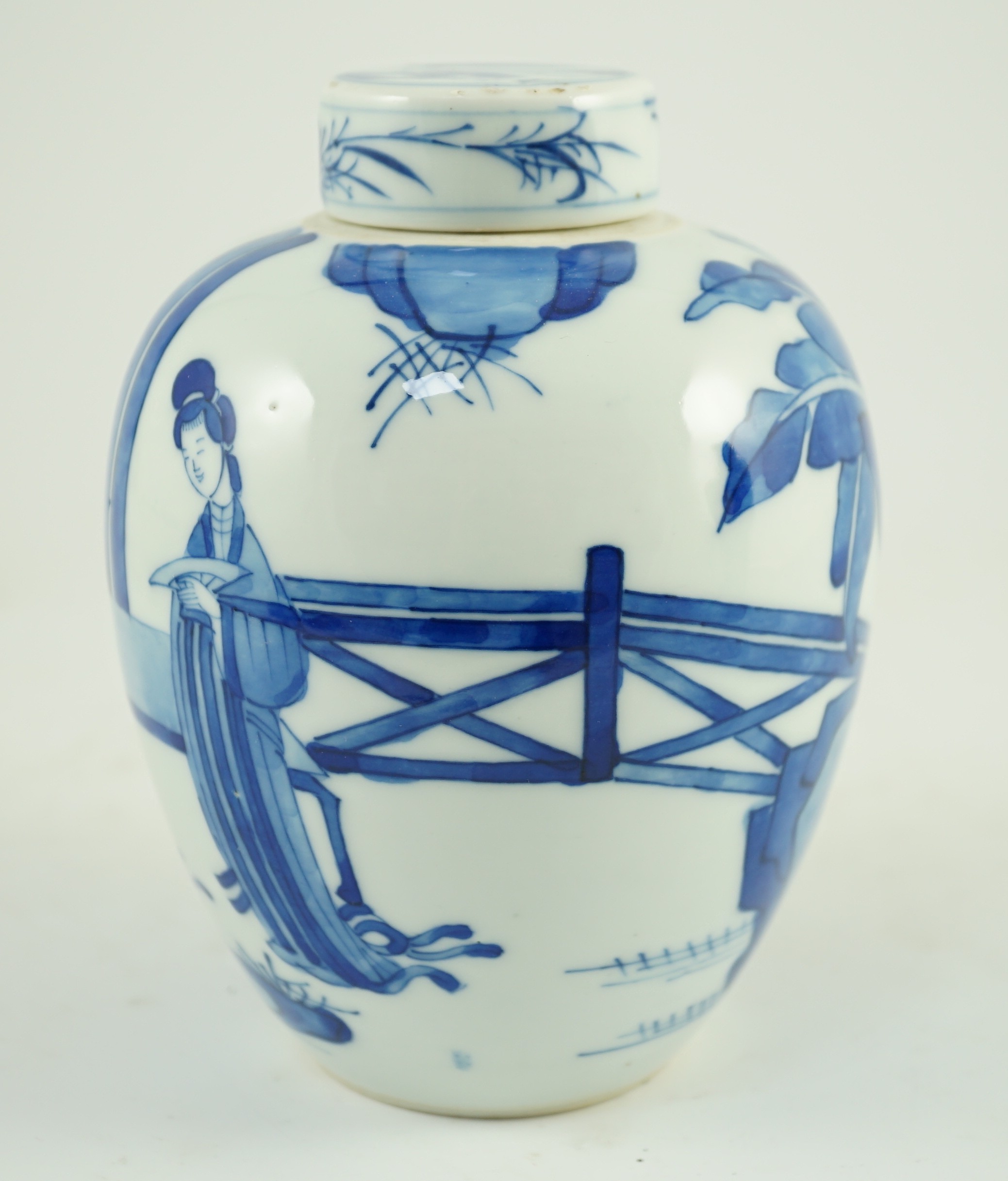 A Chinese blue and white jar and cover, probably Kangxi period, 15 cms high, 14.8cm high, small glaze losses to cover